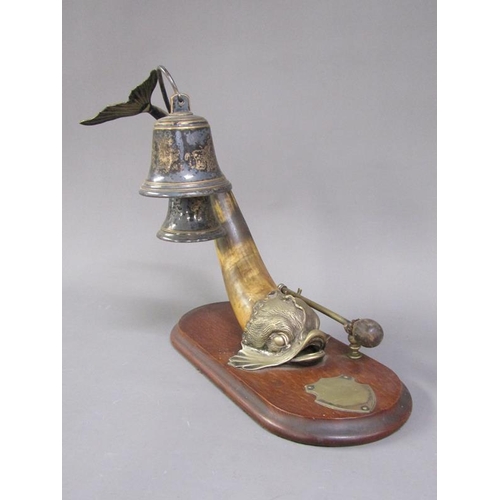 44 - A Victorian dinner gong in the form of a horn bodied dolphin with brass head, fin and tail, supporti... 