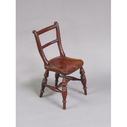 49 - A Victorian miniature fruitwood scroll back Windsor chair, on the under side of the seat an attached... 