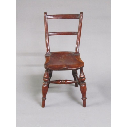 49 - A Victorian miniature fruitwood scroll back Windsor chair, on the under side of the seat an attached... 