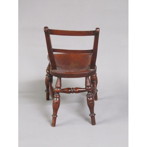 49 - A Victorian miniature fruitwood scroll back Windsor chair, on the under side of the seat an attached... 