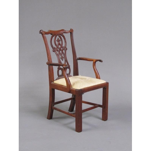 50 - A miniature mahogany open armchair in a mid Georgian style, the pierced vase shaped splat, shaped to... 