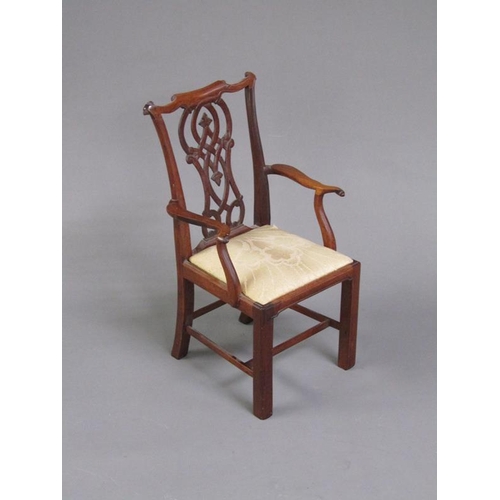 50 - A miniature mahogany open armchair in a mid Georgian style, the pierced vase shaped splat, shaped to... 