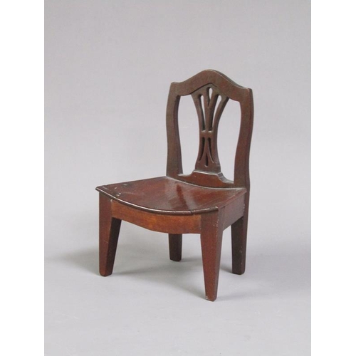 51 - A late Georgian mahogany miniature single chair with a concave solid seat, pierced vase splat, shape... 