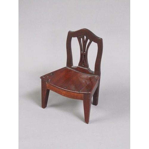 51 - A late Georgian mahogany miniature single chair with a concave solid seat, pierced vase splat, shape... 