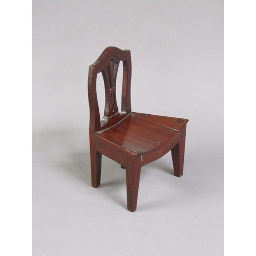 51 - A late Georgian mahogany miniature single chair with a concave solid seat, pierced vase splat, shape... 