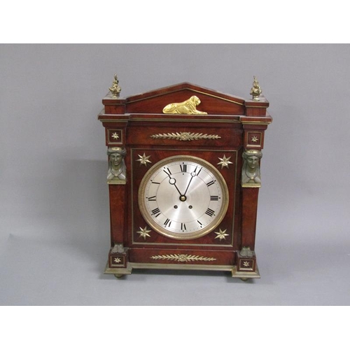 16 - An early 19c large French mantel clock, the rectangular mahogany case having a 24cm diam silvered di... 