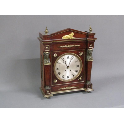 16 - An early 19c large French mantel clock, the rectangular mahogany case having a 24cm diam silvered di... 