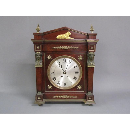 16 - An early 19c large French mantel clock, the rectangular mahogany case having a 24cm diam silvered di... 