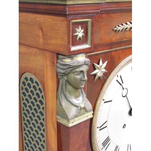 16 - An early 19c large French mantel clock, the rectangular mahogany case having a 24cm diam silvered di... 