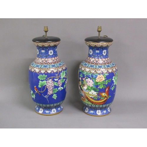 34 - A pair of large electroliers, the columns formed by cloisonné baluster vases decorated with fruit, f... 