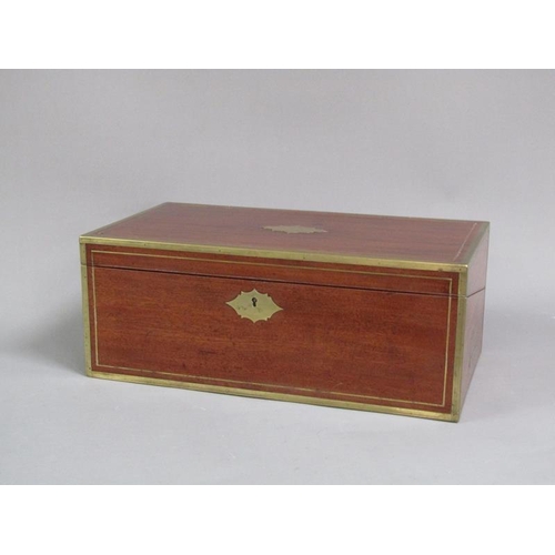 40 - An early 19c mahogany writing box, brass rail inlaid with brass edges and cut motif to the cover, gr... 