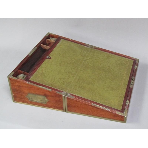 40 - An early 19c mahogany writing box, brass rail inlaid with brass edges and cut motif to the cover, gr... 