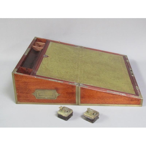 40 - An early 19c mahogany writing box, brass rail inlaid with brass edges and cut motif to the cover, gr... 