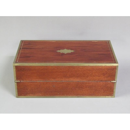 40 - An early 19c mahogany writing box, brass rail inlaid with brass edges and cut motif to the cover, gr... 