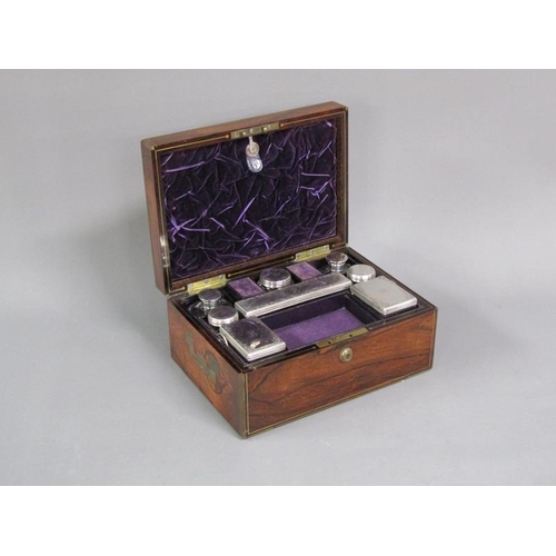 41 - A George IV figured walnut travelling box with brass rail inlay and edging, the box with original ve... 