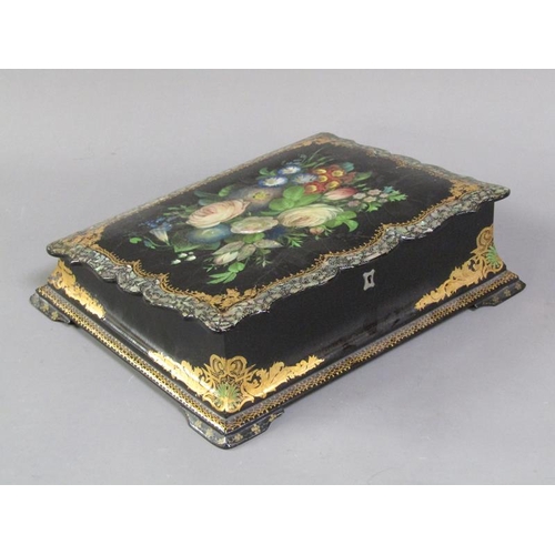 43 - A Victorian papier mache writing box, black lacquered and with a floral painted and mother of pearl ... 