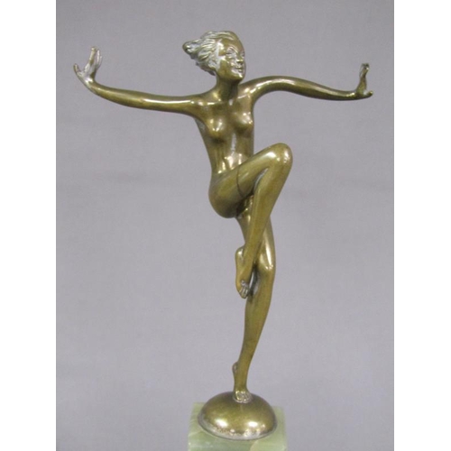 72 - A Joseph Lorenzl Art Deco gilt metal dancing figure of a lady on a onyx plinth, the figure 16cm h, 2... 