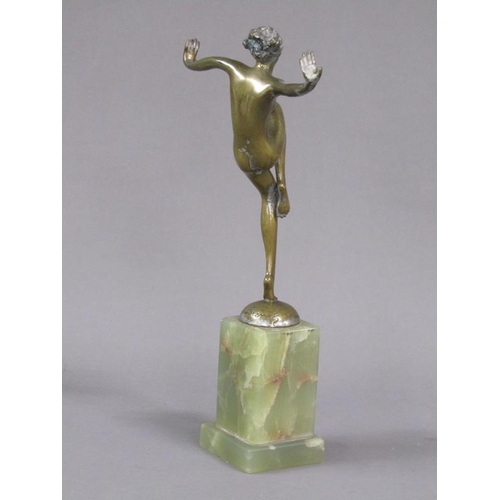 72 - A Joseph Lorenzl Art Deco gilt metal dancing figure of a lady on a onyx plinth, the figure 16cm h, 2... 