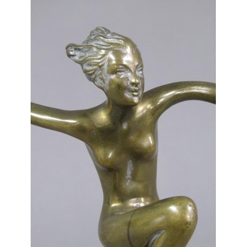 72 - A Joseph Lorenzl Art Deco gilt metal dancing figure of a lady on a onyx plinth, the figure 16cm h, 2... 