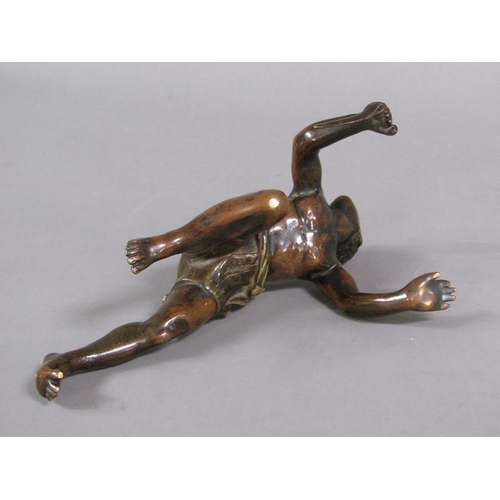 73 - A Franz Bergman patent design cold painted bronze figure of an African Warrior with knife drawn, 13c... 