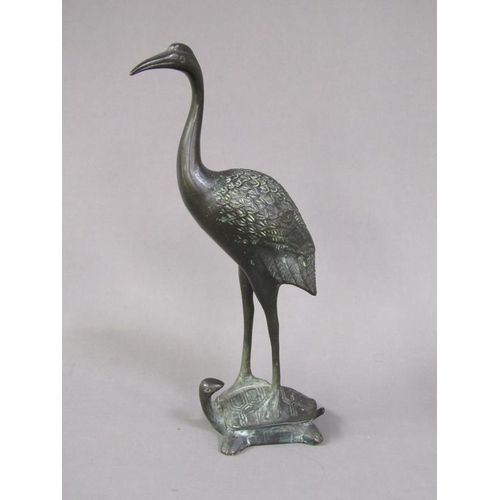 75 - An Oriental bronze figure of a crane standing on a turtle, 19.5cm h.