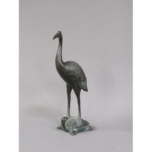 75 - An Oriental bronze figure of a crane standing on a turtle, 19.5cm h.