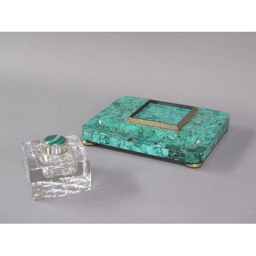 79 - A 19c malachite ink stand supporting a cut glass well with a hinged malachite mounted cover within a... 