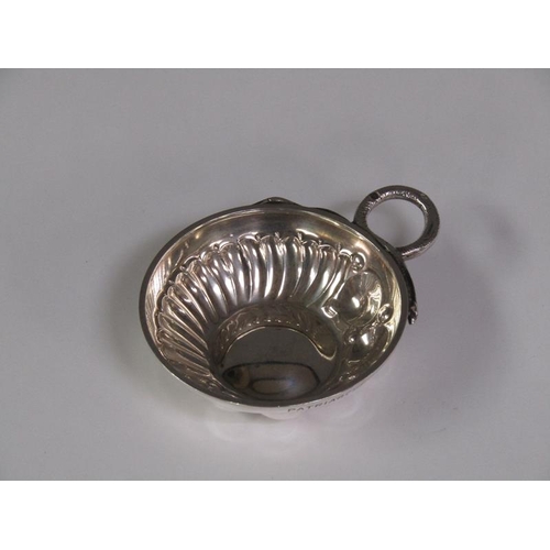 151 - A late 19c/early 20c French silver wine taster with a serpent handle, 9cm w overall.