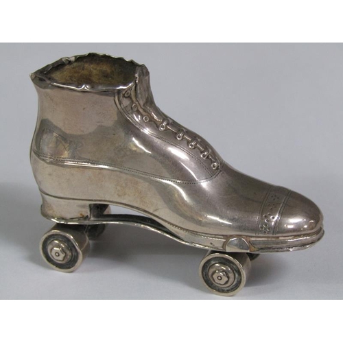 154 - An Edwardian silver roller boot pin cushion (pin cushion missing), Birmingham 1909, 7cm h.