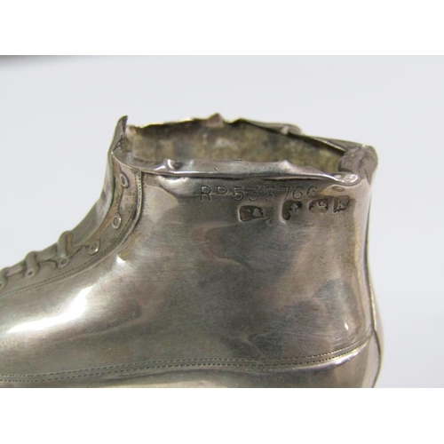 154 - An Edwardian silver roller boot pin cushion (pin cushion missing), Birmingham 1909, 7cm h.