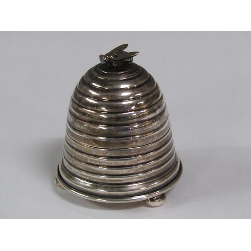 155 - A silver beehive ring box with a bee finial, supported on three ball feet, London 1970/80, 5cm h.