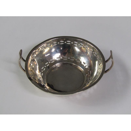 158 - A pair of pierced two handled silver bonbon dishes, Birmingham 1914, 2.4oz t, 9cm diam.