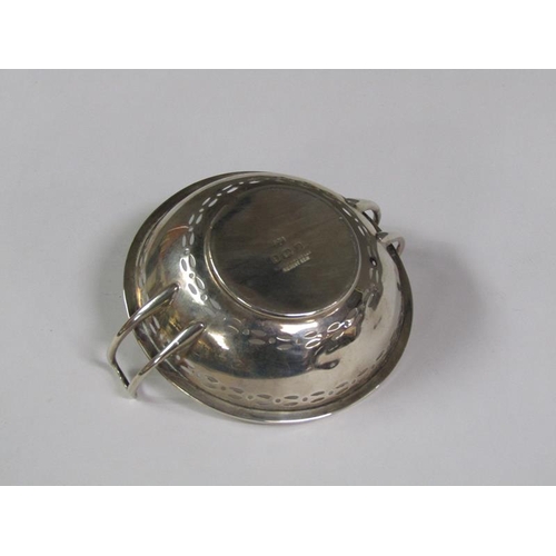 158 - A pair of pierced two handled silver bonbon dishes, Birmingham 1914, 2.4oz t, 9cm diam.