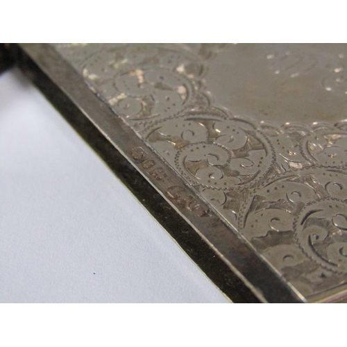 164 - A late Victorian visiting card case with shaped edge, chased all over with scroll and leaf designs, ... 