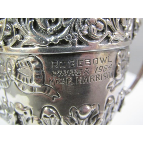 168 - A two handled silver trophy, embossed and chased, London 1910, 6oz t, 14cm h.