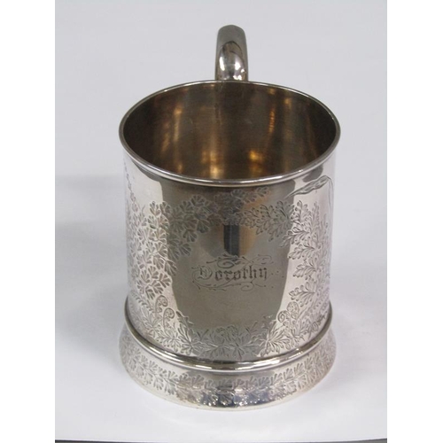 174 - A late Victorian christening tankard named 'Dorothy' and incised with leaf and flowers, London 1885,... 