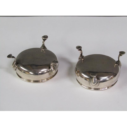 177 - A pair of late Georgian salt cellars with gadroon upper rims and supported on three hoofed feet, Lon... 