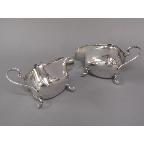 188 - A pair of silver Georgian style sauce boats, Sheffield 1940, total 11oz t, each 19cm l.