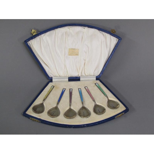 189 - A boxed set of silver gilt and enamel ice cream spoons, in presentation box, Birmingham 1929.