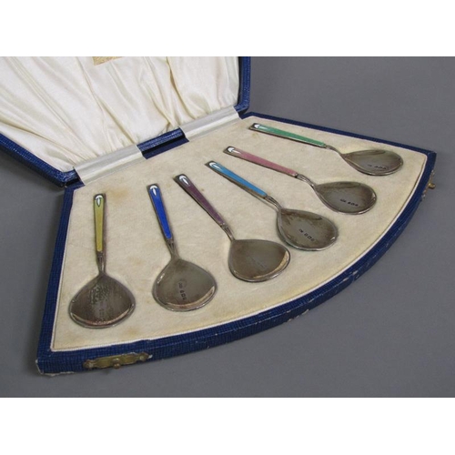 189 - A boxed set of silver gilt and enamel ice cream spoons, in presentation box, Birmingham 1929.