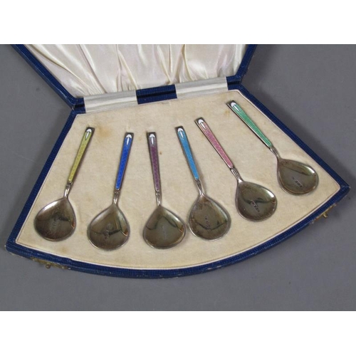 189 - A boxed set of silver gilt and enamel ice cream spoons, in presentation box, Birmingham 1929.