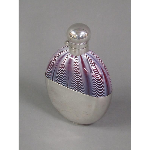 208 - An early 20c Nailsea glass pocket flask with a silver plated hinged domed cover and pull off base to... 