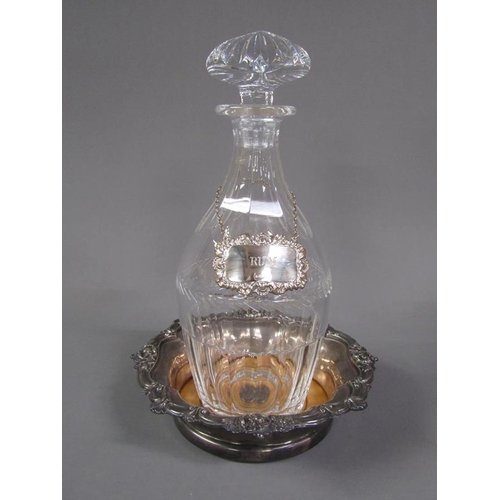 209 - A pair of 19c cut glass decanters with silver labels, together with a pair of Sheffield plated coast... 