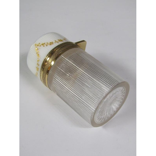 59 - An early 20c French cosmetic salts bottle and stopper with a vertically ribbed cylindrical body with... 