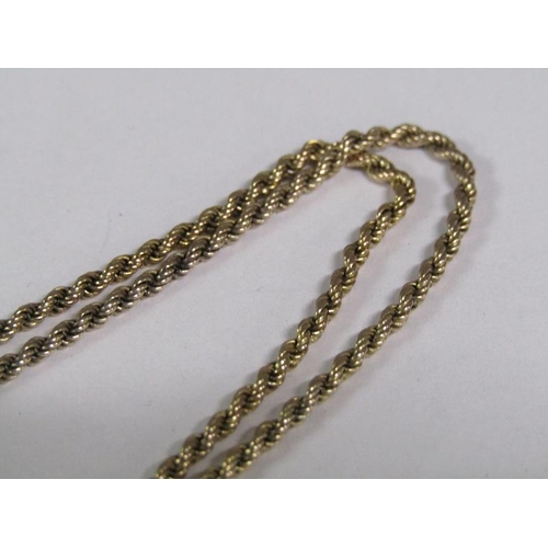 109 - An Edwardian period 9ct gold rope twist necklace with two tassel pendants, 21.5g.