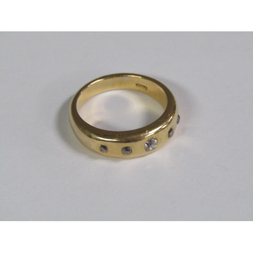 118 - An 18ct gold ring set with five cut diamonds, 9.5g.