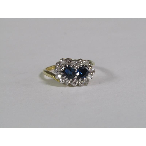 119 - An 18ct gold twin set sapphire and diamond ring.