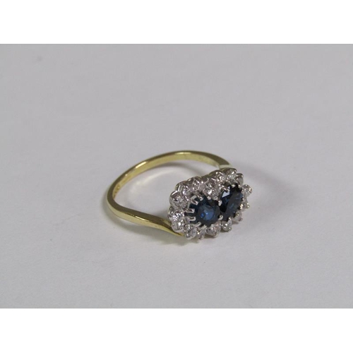 119 - An 18ct gold twin set sapphire and diamond ring.