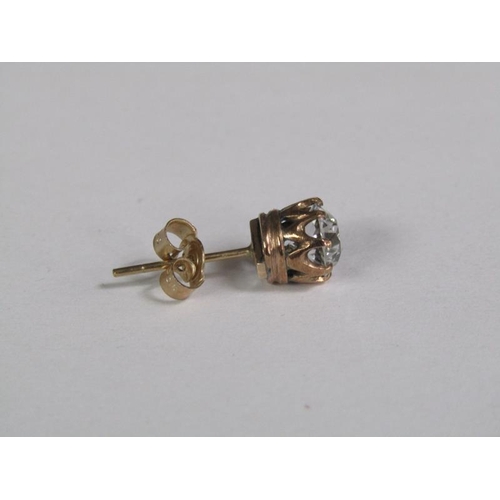 123 - A pair of gold ear studs, each coronet set with a cut diamond, each approx. 0.5ct.