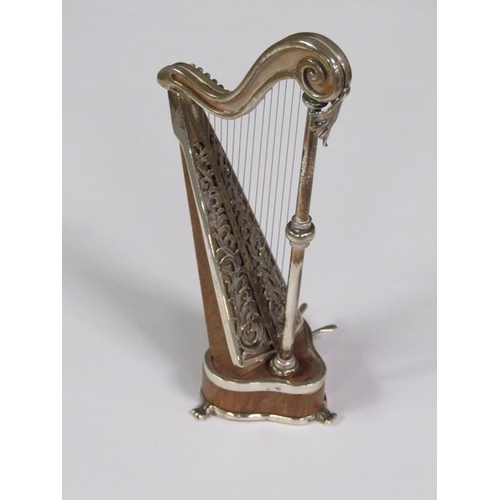 58 - An early 20c miniature model of a harp constructed of wood and white metal, bearing a name plate 'Sa... 